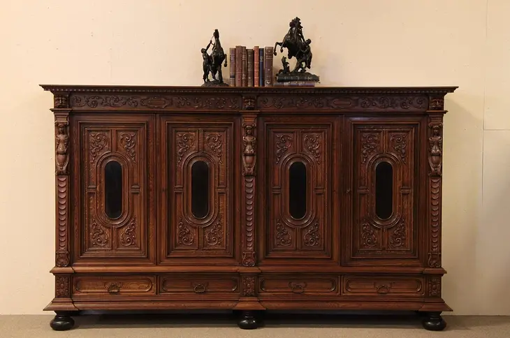 Solid Oak Antique 8' Cabinet with Carved Figures