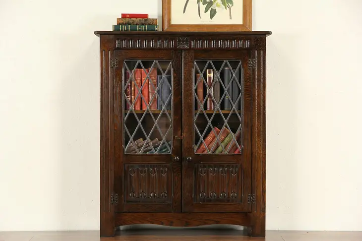 English Tudor Carved Oak 1915 Antique Bookcase, Leaded Glass Doors