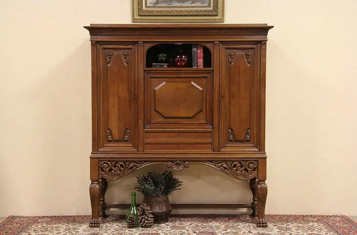 Renaissance Carved 1900 Antique Oak Bar or Library Cabinet
