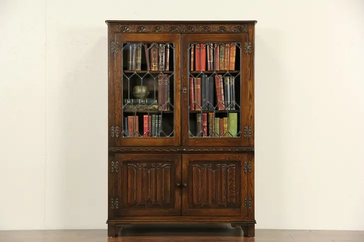 English Tudor Carved Oak 1915 Antique Bookcase, Leaded Glass, 4  Doors