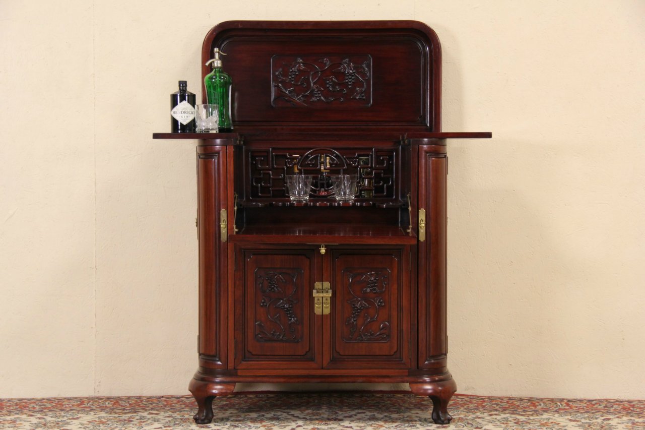Chinese carved on sale bar cabinet
