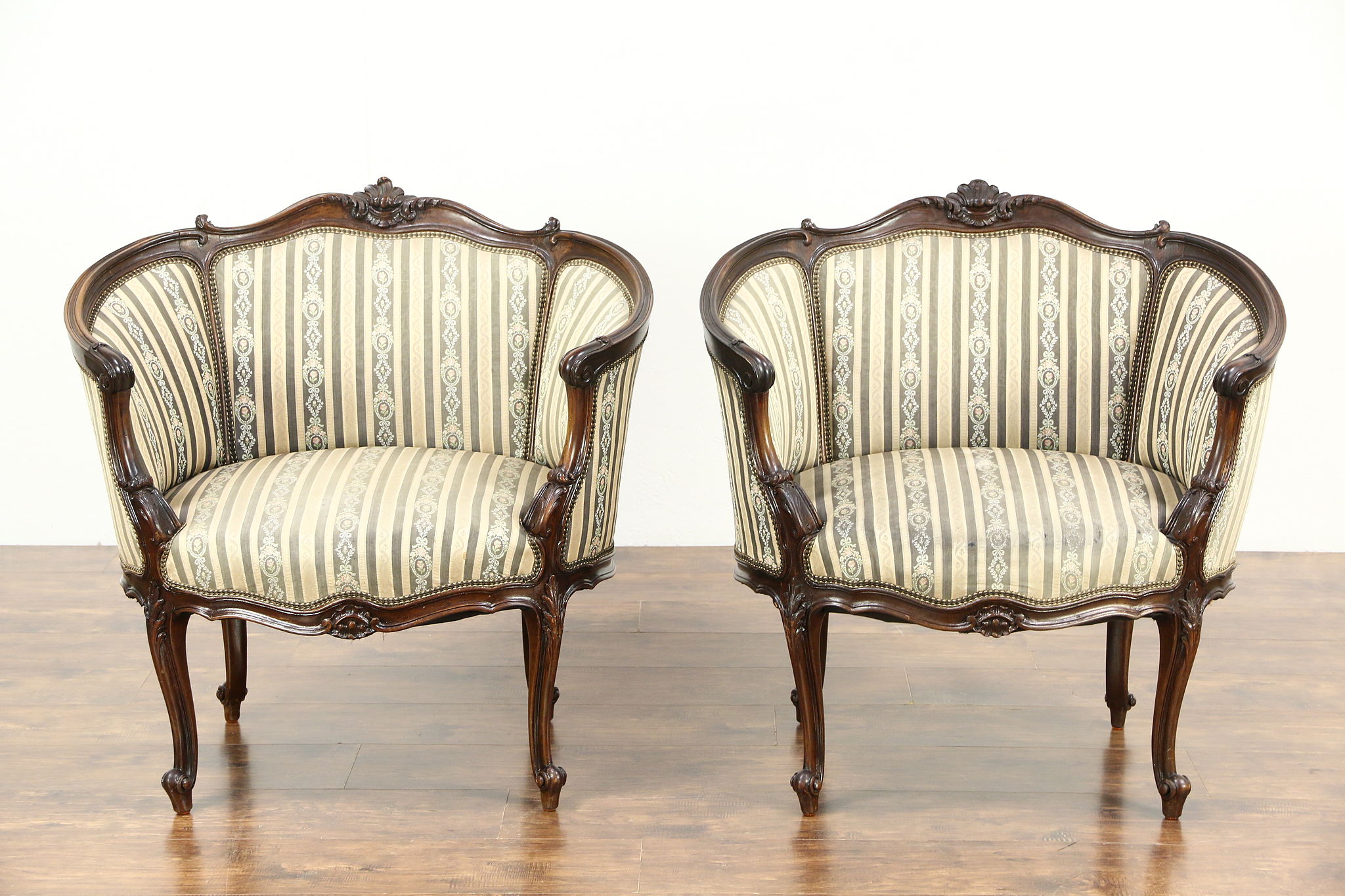 Antique pair of upholstered Louis XIV-style salon chairs, walnut