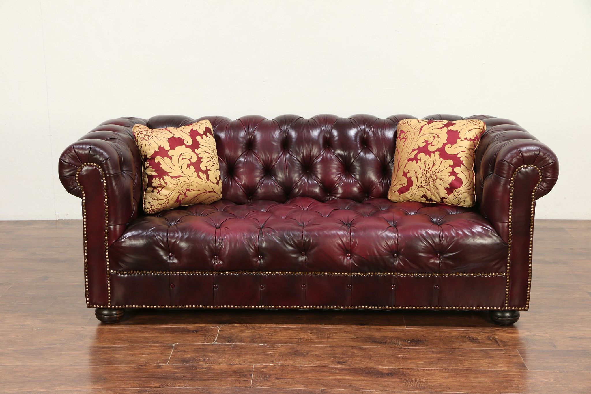 Vintage tufted leather sofa deals