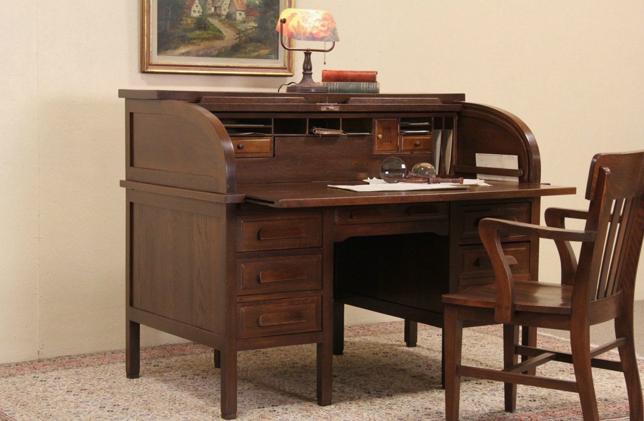 Antique desk with pull store out writing surface