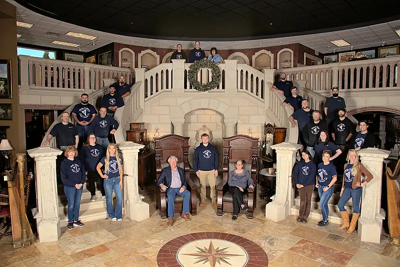 Harp Gallery Team in Kaukauna Wisconsin Showroom Harp Gallery team with founders Kenneth and Rebecca Melchert inside the antique and vintage furniture showroom in Kaukauna Wisconsin