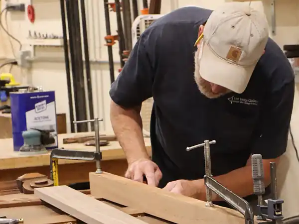 craftsman restoring furniture