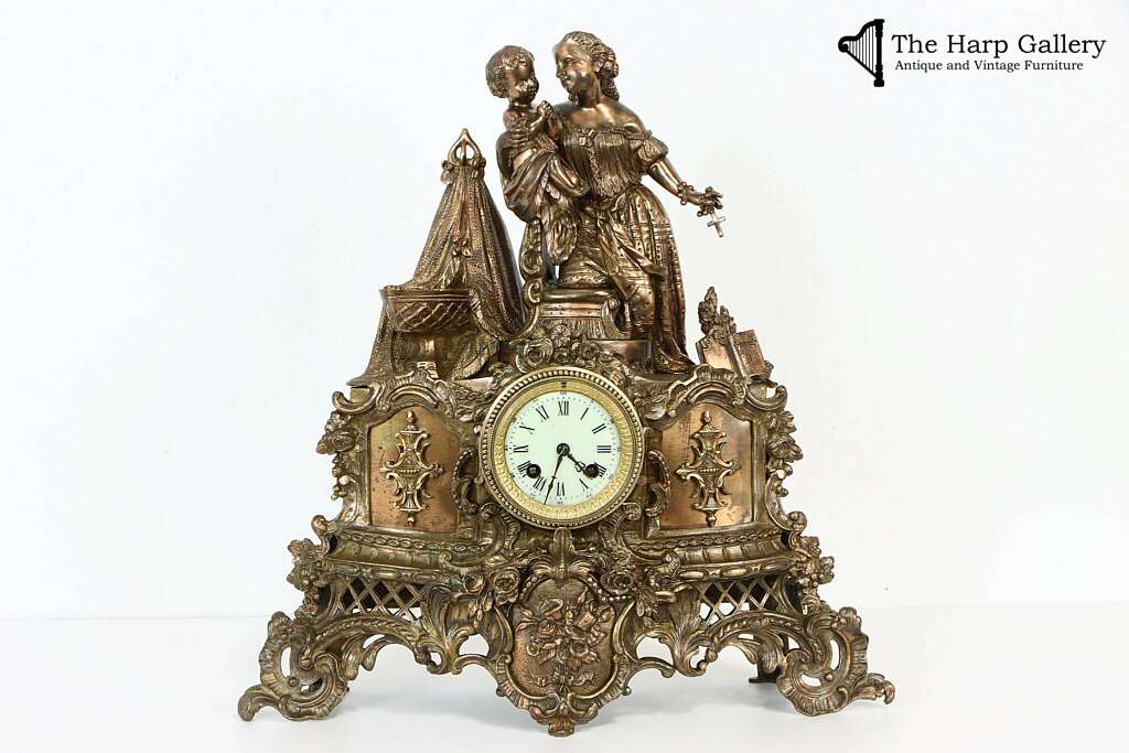 ornately detailed bronze antique clock