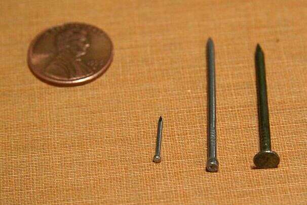tiny L-shaped antique nails