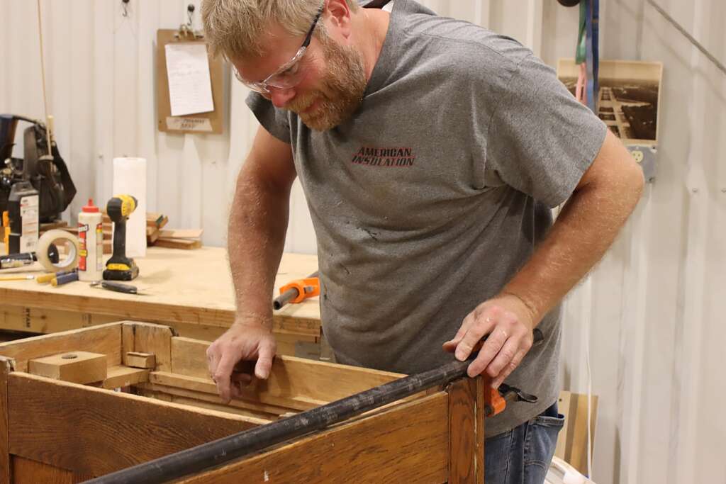 artisan restoring antique
