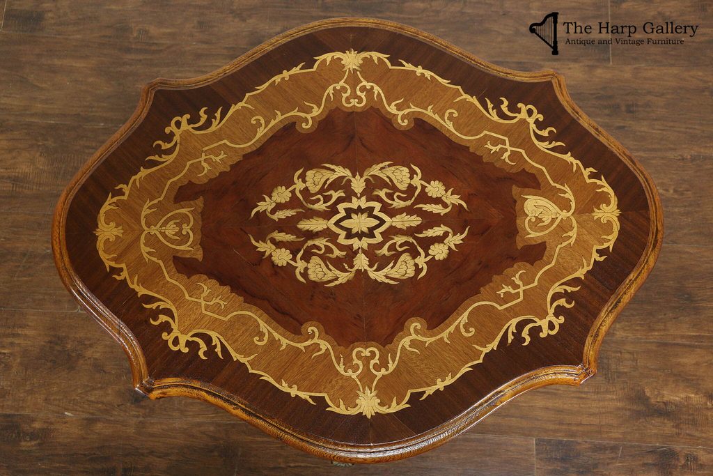 Restored antique wood veneer and decorative marquetry inlay detail
