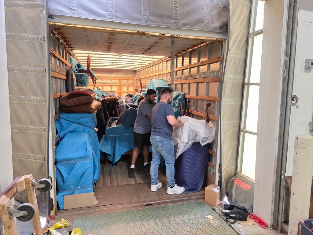 Harp Gallery team carefully loading antique furniture for transportation and delivery