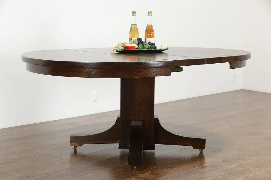 Main image of Craftsman Oak Antique Round 50" Dining Table, 2 Leaves, Extends 74"