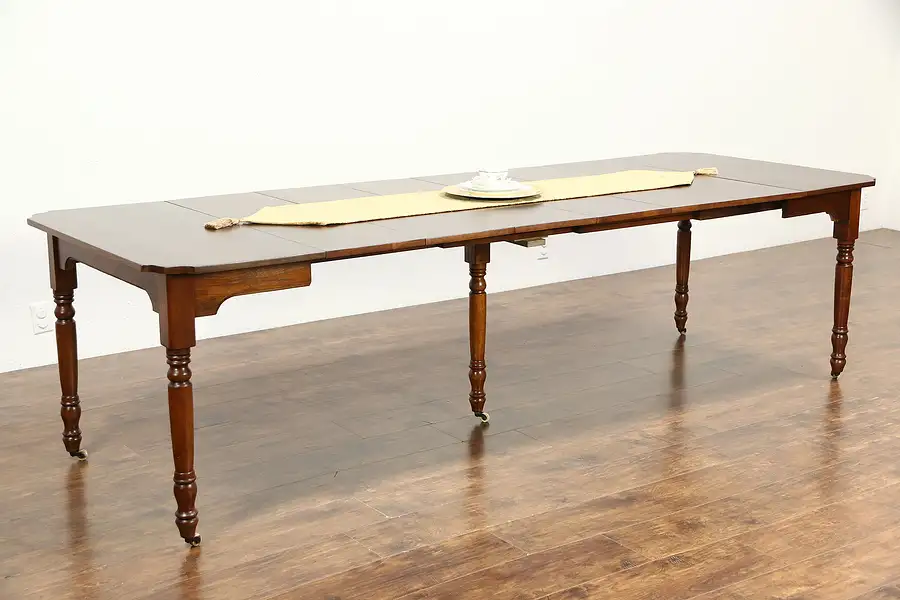 Main image of Victorian Antique 1890 Walnut Dining Table, 5 Legs, 6 Leaves Extends 9'