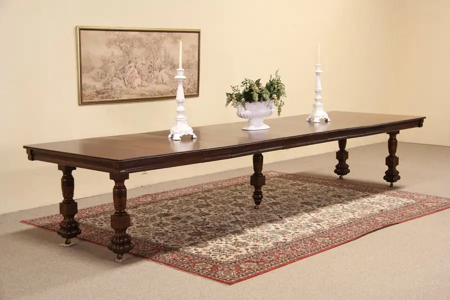 Main image of Oak 1900 Antique Dining Table, Paw Feet, 8 Leaves Extends 13'