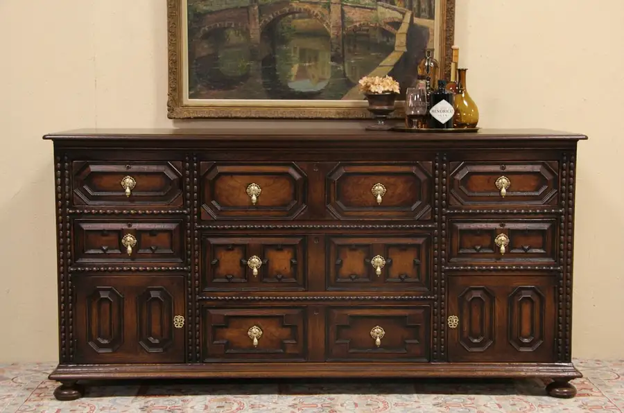 Main image of English Tudor 1925 Antique Carved Oak Sideboard Server