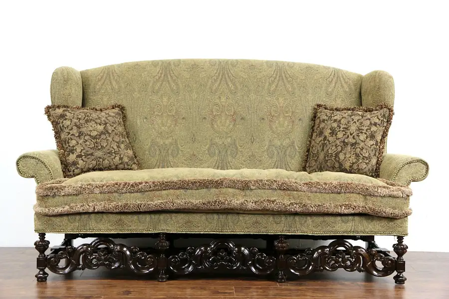 Main image of English Renaissance Style Tall Wing Carved Walnut Vintage Sofa, 1 of 2