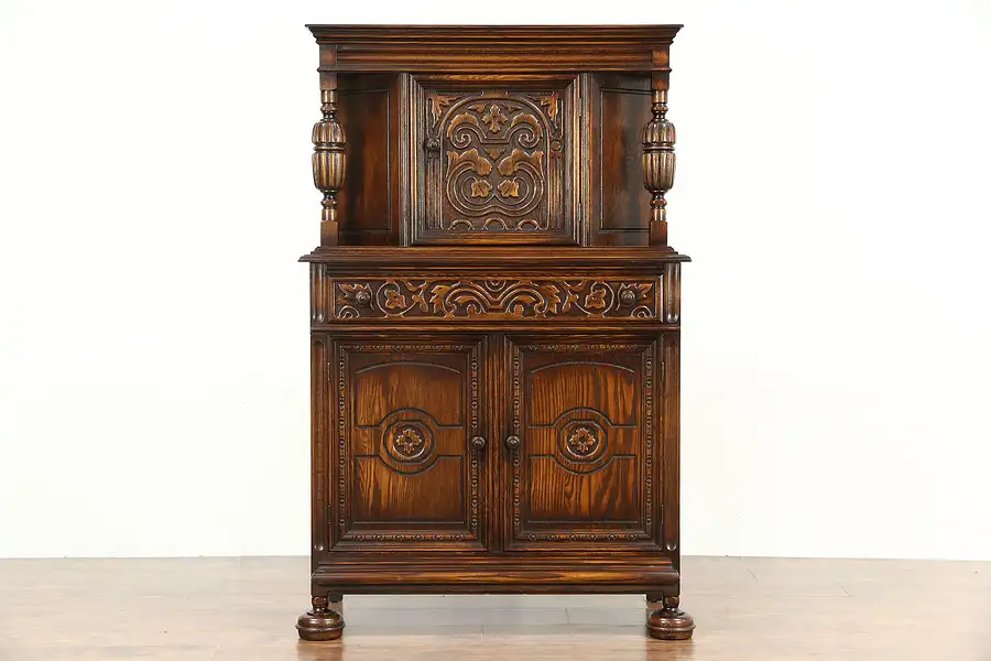 Main image of English Tudor Style 1920 Antique Carved Oak Bar or China Cabinet