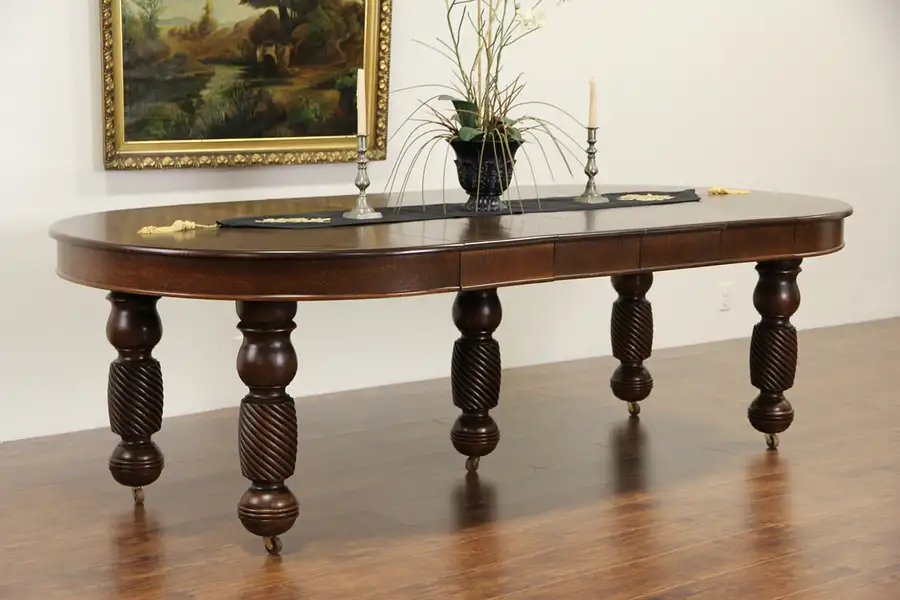 Main image of Round Oak 1900 Antique Dining Table, 4 Leaves Extends 8' 4"