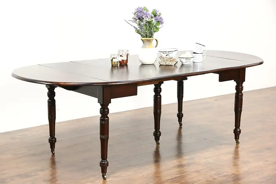 Main image of Victorian 1880 Antique Walnut Dining Table, 5 Legs, 3 Leaves Extends 7' 10"