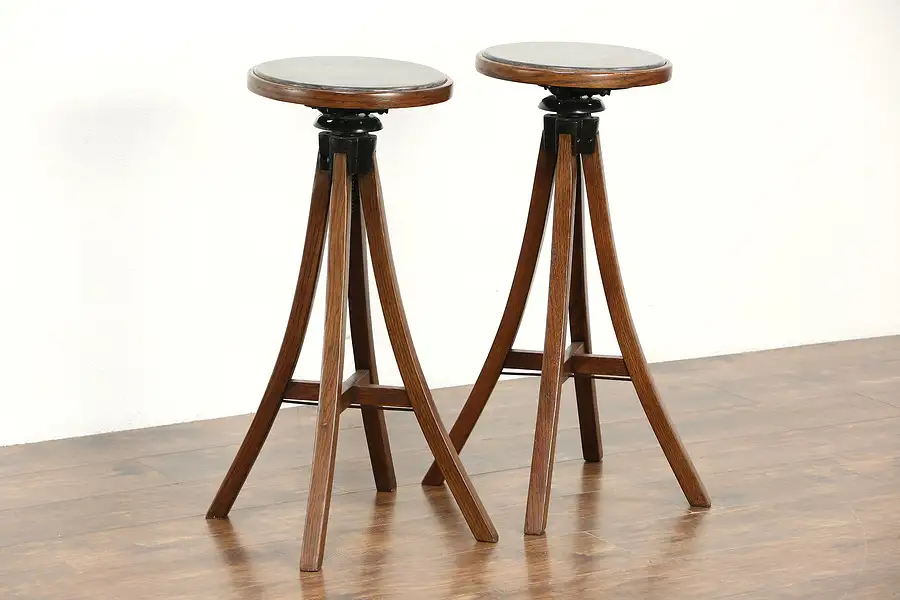 Main image of Pair Oak 1910 Antique Craftsman Swivel Adjustable Stools or Plantstands
