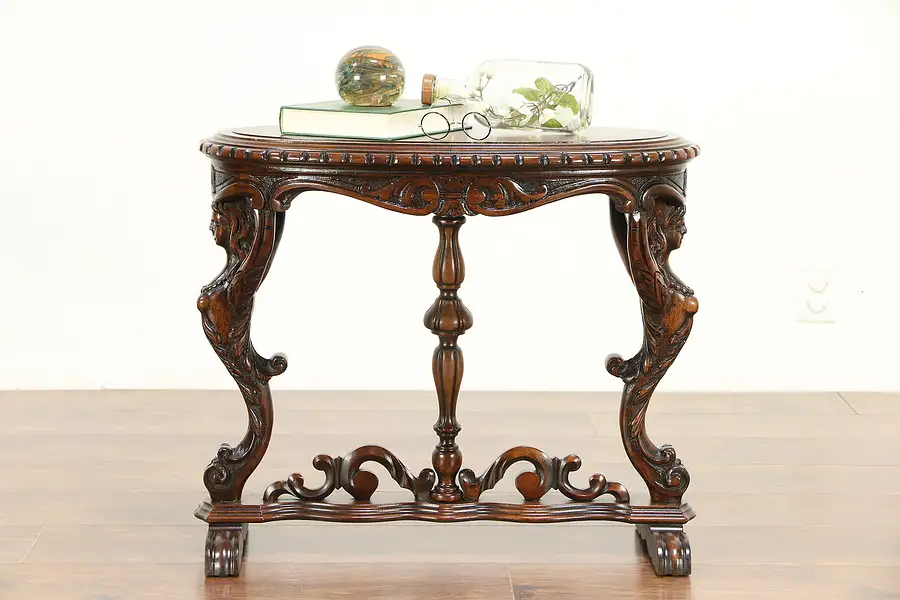 Main image of Walnut Antique Oval Chairside or Small Coffee Table, Carved Figures