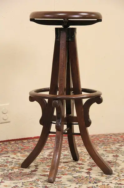 Main image of Arts & Crafts 1900 Antique Oak Adjustable Swivel Stool, Footrest Ring