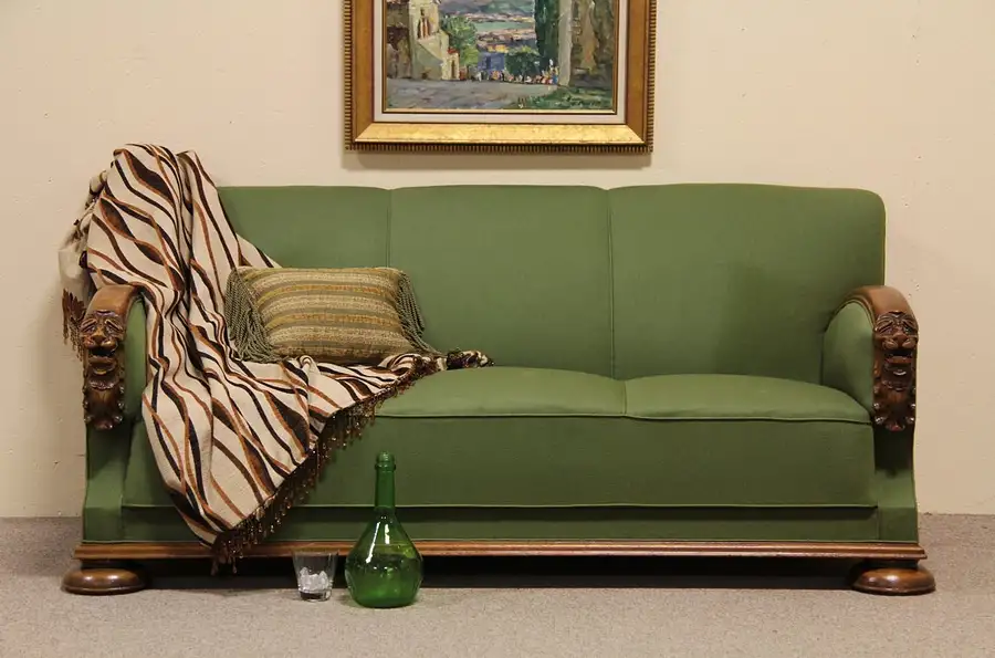 Main image of Carved Oak Lion Head Antique Sofa