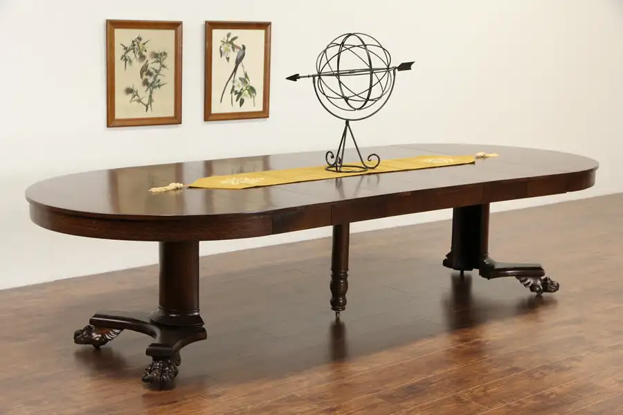 Main image of Round Oak 52" Antique 1900 Dining Table, Lion Paws, 6 Leaves, Extends 10' 4"