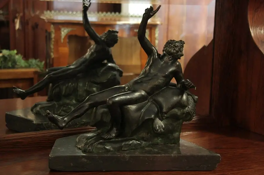 Main image of Bronze Antique Sculpture, Man Resting on Lion Skin