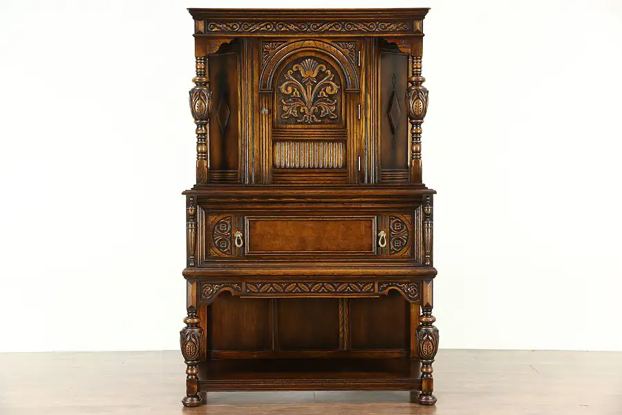 Main image of English Tudor 1925 Carved Oak China Cabinet