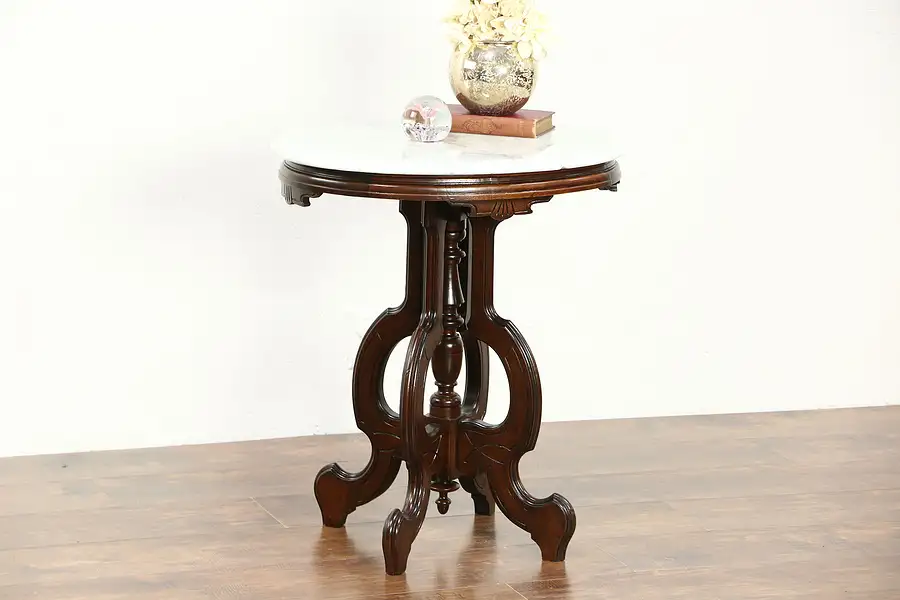Main image of Victorian 1885 Antique Oval Marble Top Walnut Lamp or Parlor Table