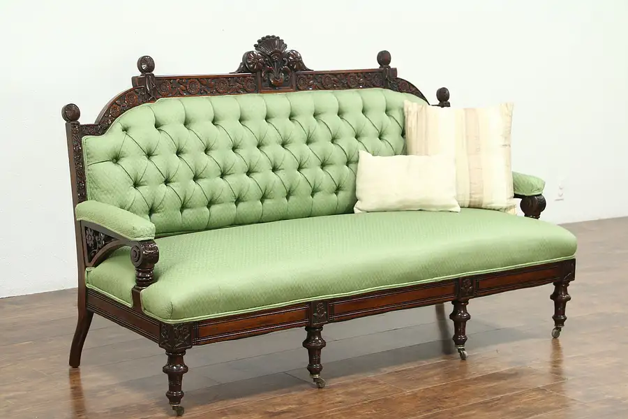 Main image of Victorian Eastlake Antique 1885 Hand Carved Walnut Sofa, Recent Upholstery