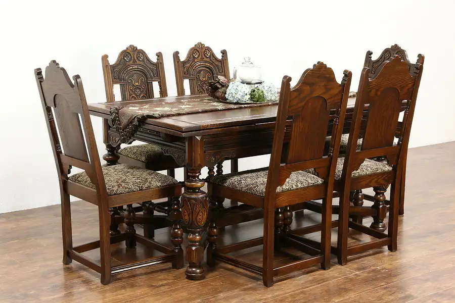 Main image of English Tudor 1925 Carved Oak Dining Set, Table& Leaves, 6 Chairs, Signed