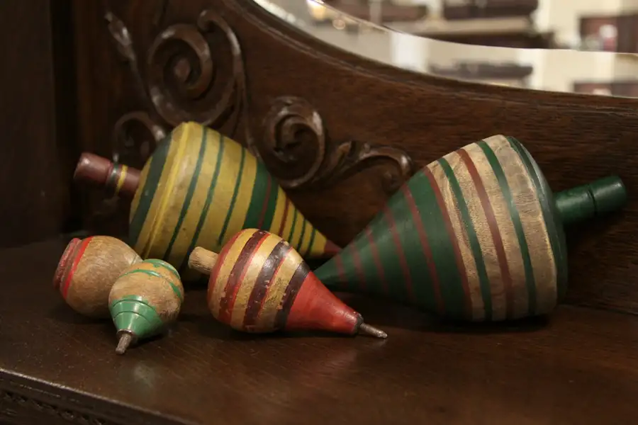 Main image of Set of 5 Painted Wooden Toy Spinning Tops