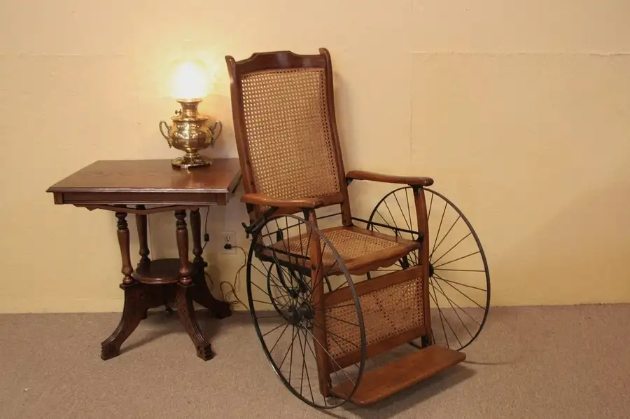 Main image of Oak 1900 Antique Wheel Chair, Wire Wheels