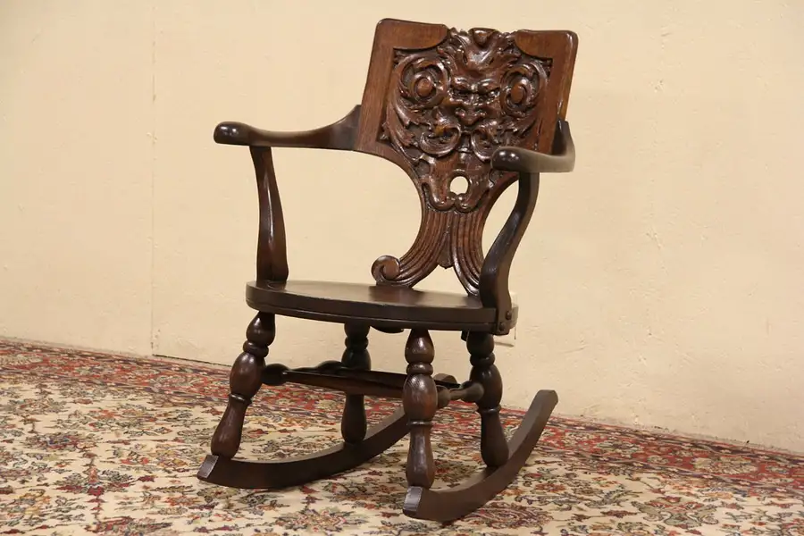 Main image of North Wind Carved Oak Signed Early 1900's Antique Rocker
