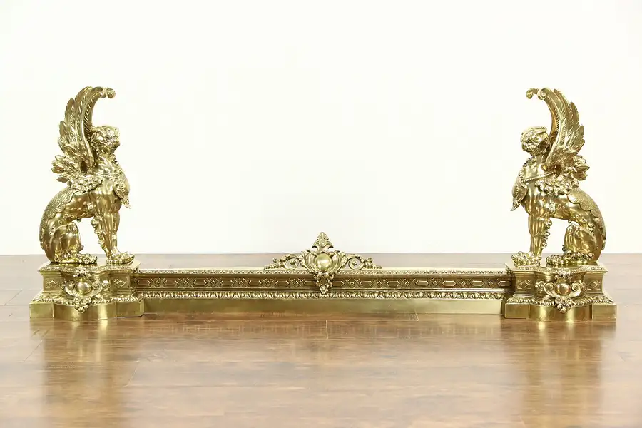 Main image of Pair Antique 1880's Cast Brass Griffin Fireplace Chevets & Fender Set