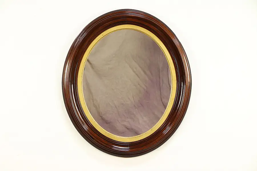 Main image of Victorian Antique 1860 Oval Mirror, Carved Walnut Frame 39" Tall