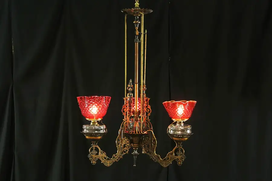 Main image of Victorian 1860's Antique Iron Electrified Chandelier, 3 Cranberry Glass Shades