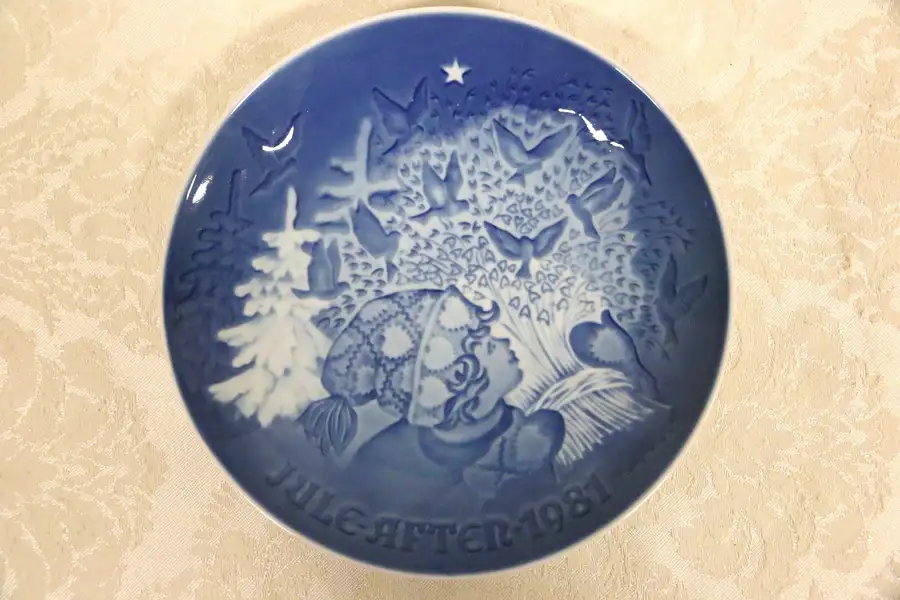 Main image of Vintage Royal Copenhagen Blue 1981 Christmas Peace Girl With Wheat & Birds Plate