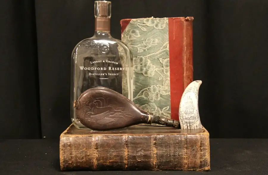 Main image of Leather 1870's Powder Flask, Embossed Rabbit & Birds