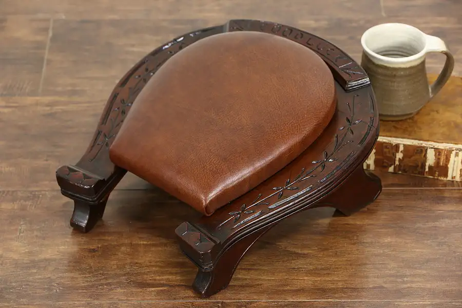 Main image of Victorian 1885 Antique Lucky Horseshoe Shaped Footstool, Leather Upholstery