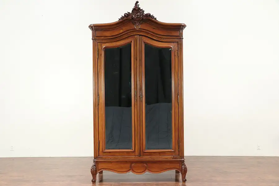 Main image of French Hand Carved Walnut Antique Armoire, Beveled Mirror Doors