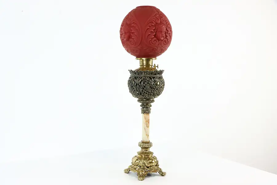 Main image of Victorian Antique Oil Lamp, Onyx Column, Red Glass Shade with Faces