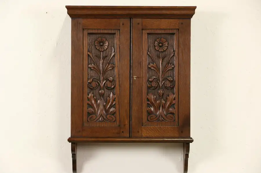 Main image of Carved Oak Scandinavian 1890's Antique Hanging Cupboard, Wall Cabinet, Pipe Rack