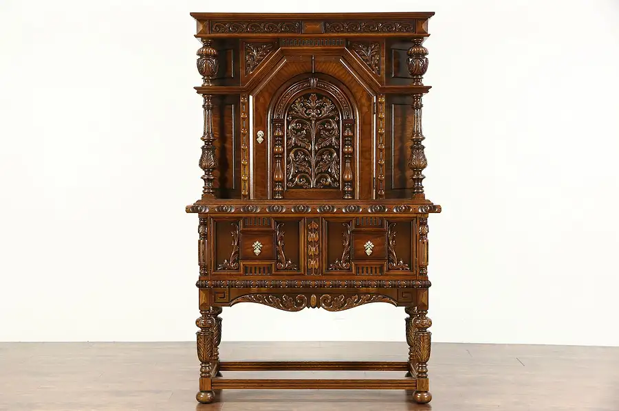 Main image of English Tudor 1925 Antique Carved Oak China or Bar Cabinet