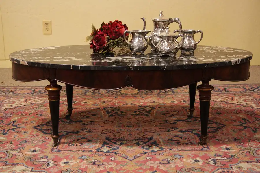 Main image of Oval Black Marble & Mahogany Coffee Table