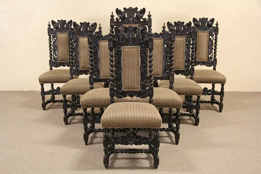 Main image of Set of 8 Black Forest Carved Oak 1890 Antique Dining Chairs, Family Crest