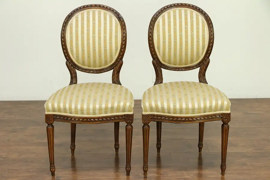 Main image of French Louis XVI Antique Pair Carved Fruitwood Side Chairs
