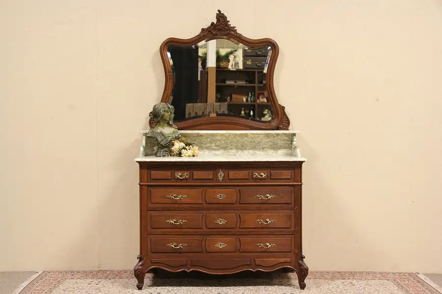 Main image of Country French 1895 Antique Carved Oak Marble Top Chest, Beveled Mirror